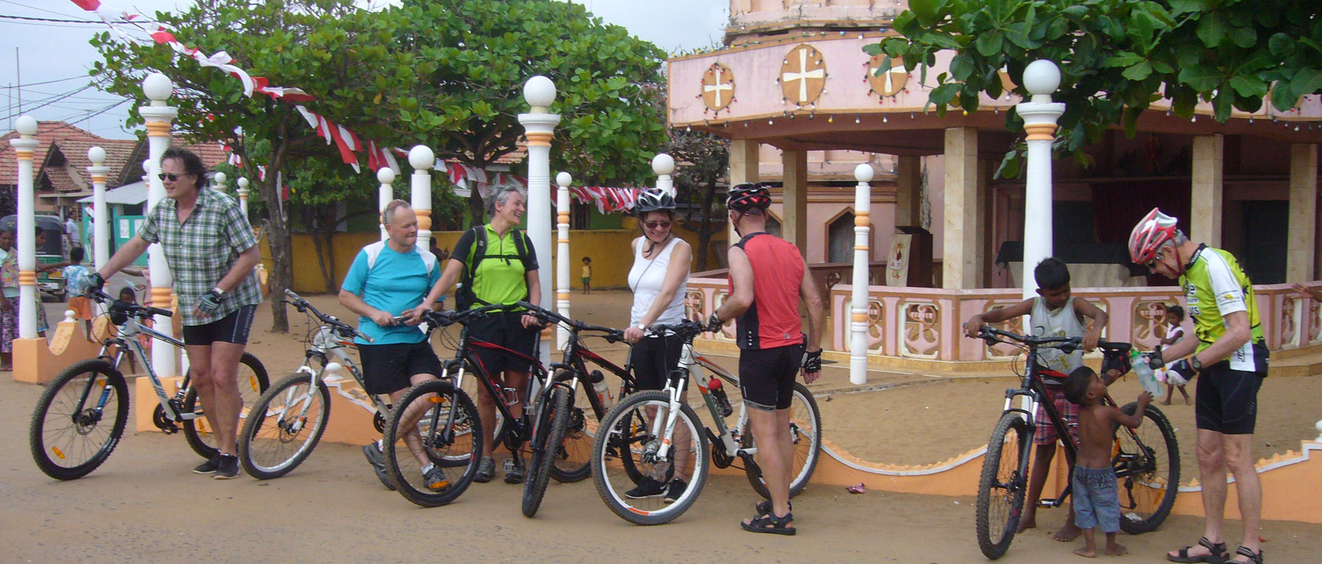 group of Cyclist in Sri Lanka look something on their Trail
